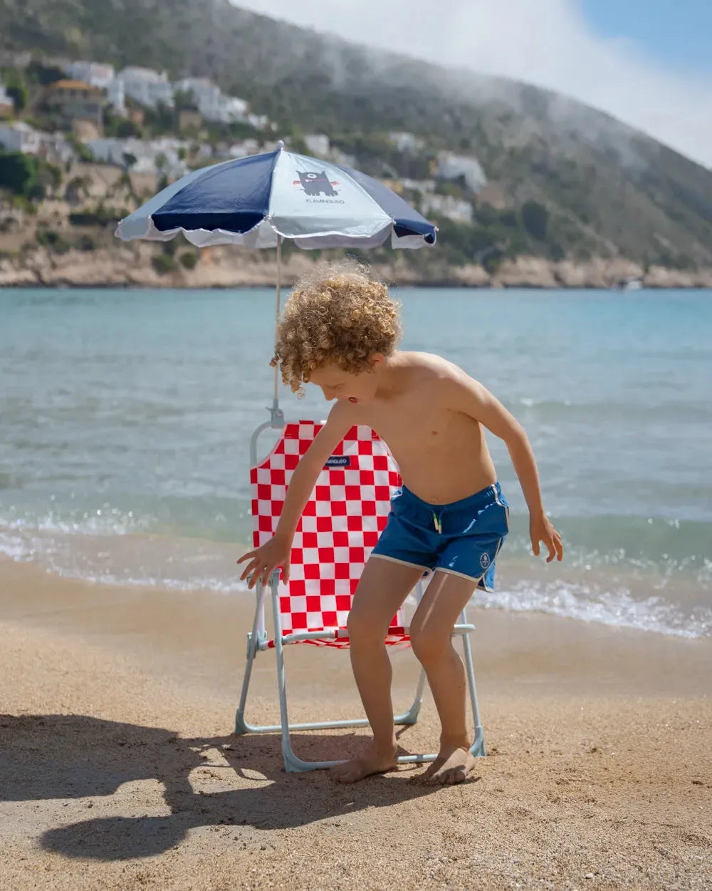 SILLA DE PLAYA CON SOMBRILLA HUSTON - FLAMINGUEO