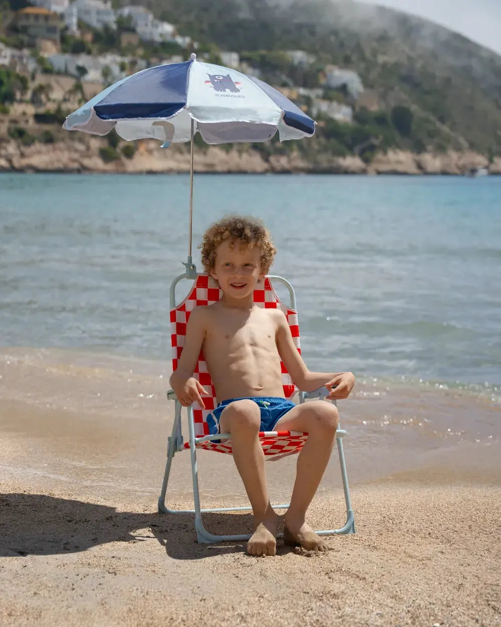 SILLA DE PLAYA CON SOMBRILLA HUSTON - FLAMINGUEO