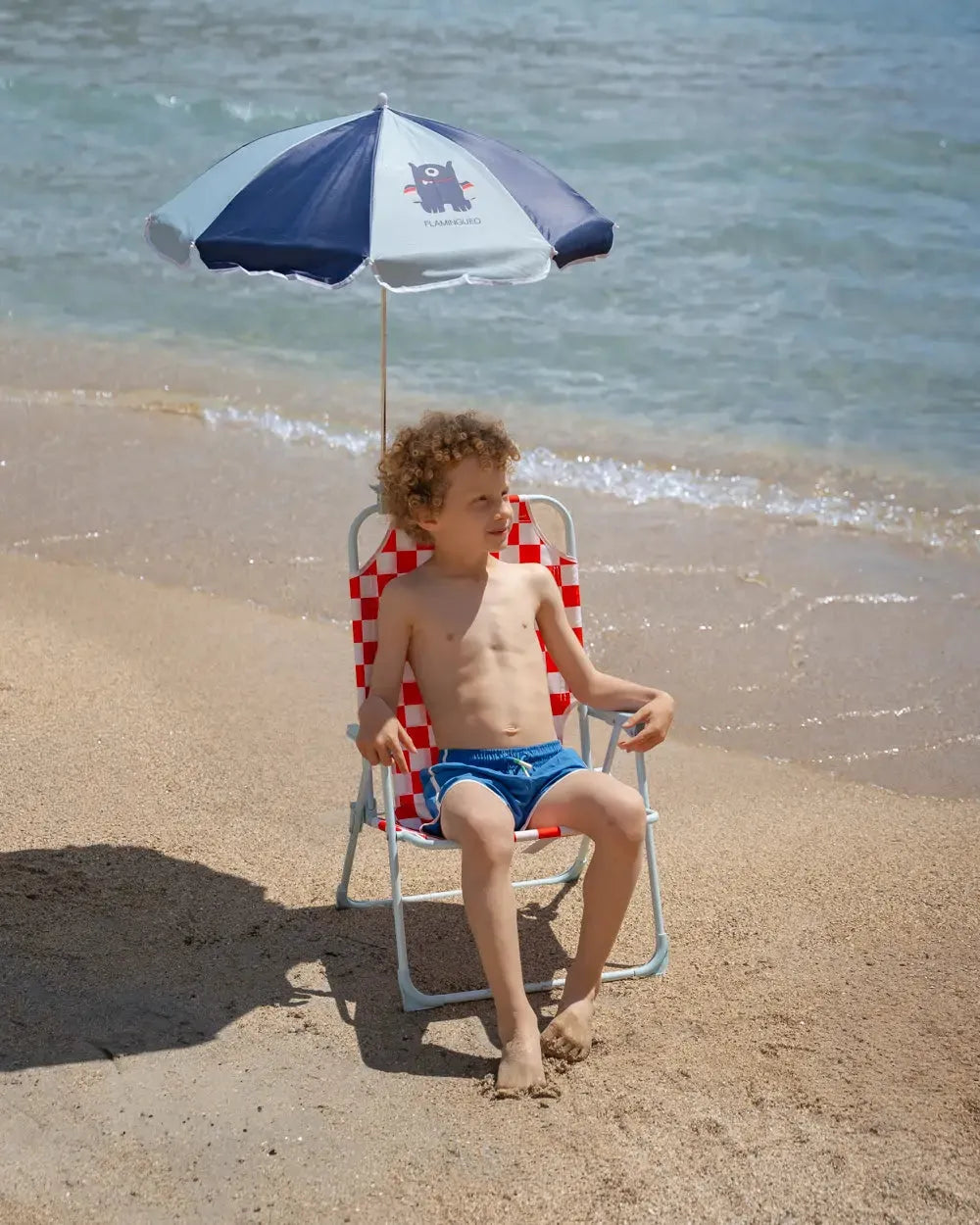 SILLA DE PLAYA CON SOMBRILLA HUSTON - FLAMINGUEO